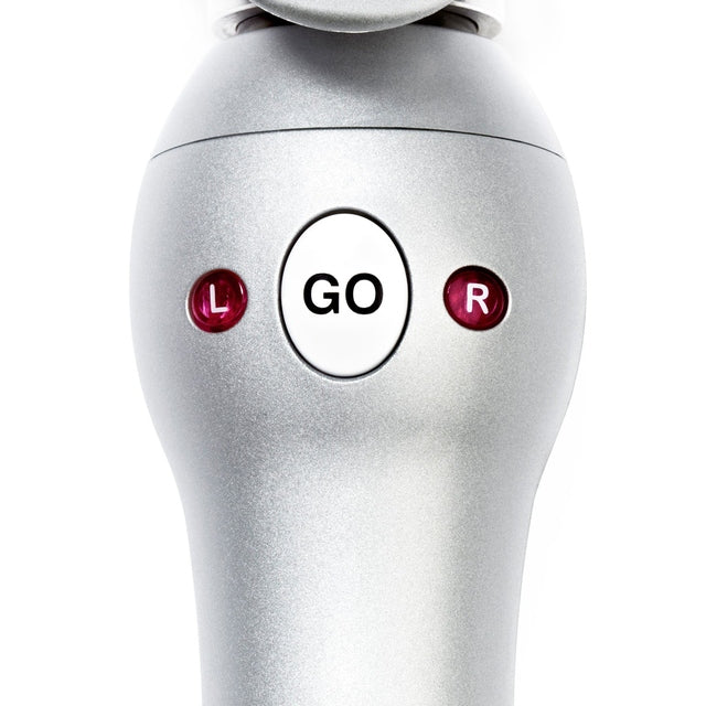 Detail of Beachwaver PRO 1 curling iron showing GO button between L and R directional buttons on handle