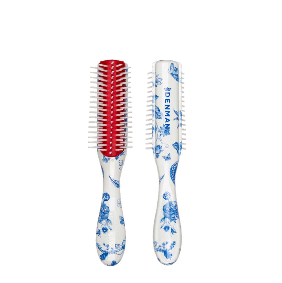 The Denman D14 Classic Mini Styler is a versatile five-row brush for detangling, smoothing, blow-drying and defining curls. Its compact size slips easily into a handbag or travel kit, while smooth, round-ended pins and a staggered pattern provide controlled grip without unnecessary catching.