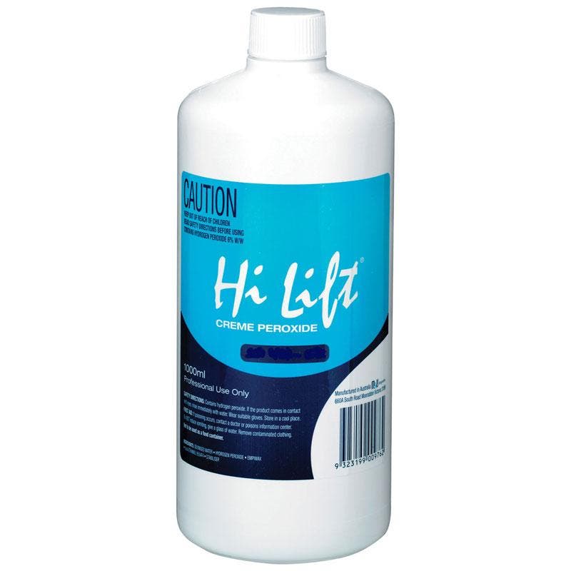 1L Hi Lift Creme Peroxide developer bottle with blue label and caution text on front