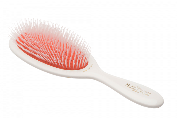 The Mason Pearson Gentle Nylon Hairbrush NG2 in Ivory is crafted for those with fine, delicate, or thinning hair who still want the legendary Mason Pearson brushing experience. 