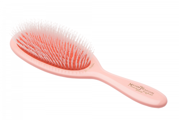  Seven rings of soft nylon tufts glide through hair with minimal tension — stimulating circulation at the scalp while distributing natural conditioning oils from root to tip for a healthy, luminous finish.