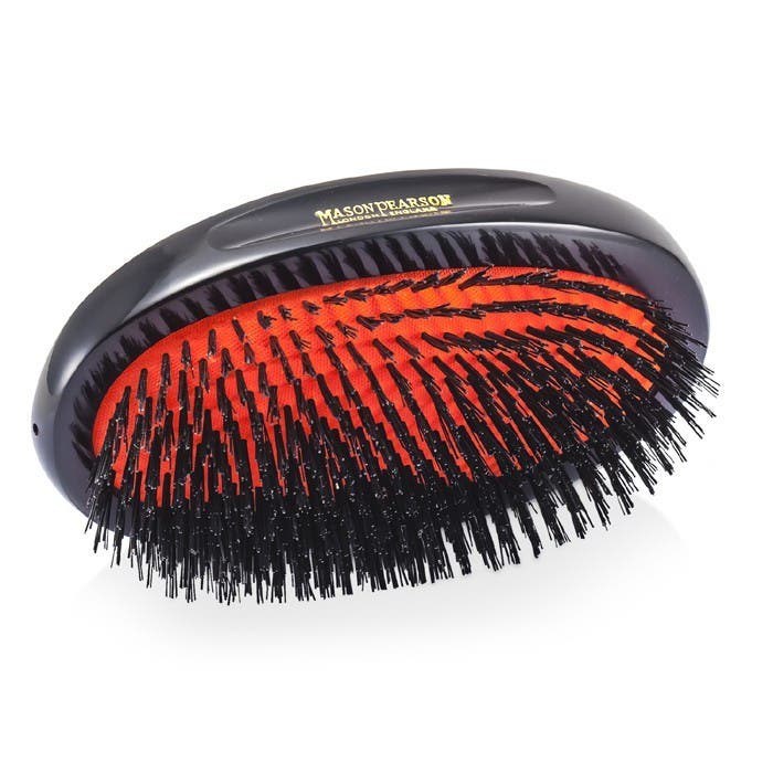 The Mason Pearson Military Sensitive uses specially-selected fine boar bristles to gently massage the scalp and stimulate natural oil production for healthier-looking, shiny hair.
