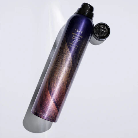 Look for the Purple hair spray bottle with wooden texture on a white background