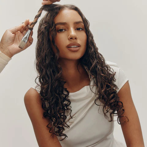 Control frizz and improve manageability without stiffness.
