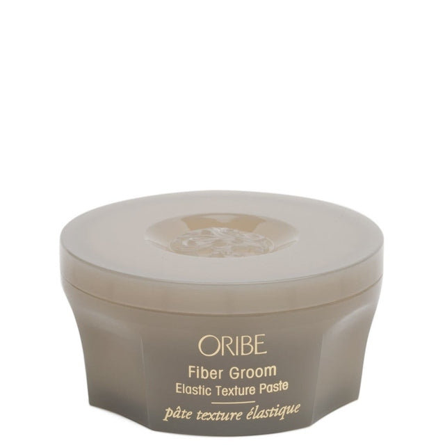 Create airy texture with Oribe Fiber Groom Elastic Texture Paste. Its new-age fibre formula fuses silken strands with next-generation polymers to create bounce, separation and elastic hold.