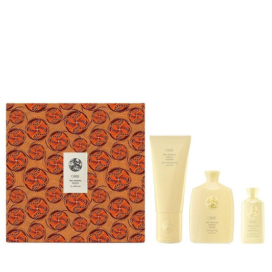 Oribe Hair Alchemy Resilience Gift Set with patterned box, shampoo, conditioner and serum bottles