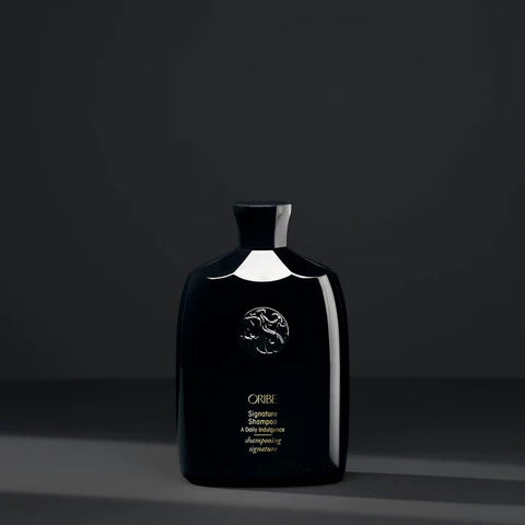 The full Oribe Signature Shampoo experience — now in a perfectly portable 75ml size.