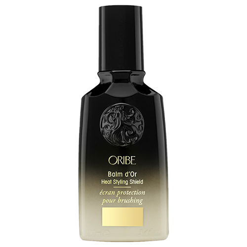  The Oribe Balm d'Or Heat Styling Shield is a superlight, heat-activated styler that protects fragile strands from thermal damage while sealing in sleekness and radiant shine — whether you're blow-drying, straightening, or curling.