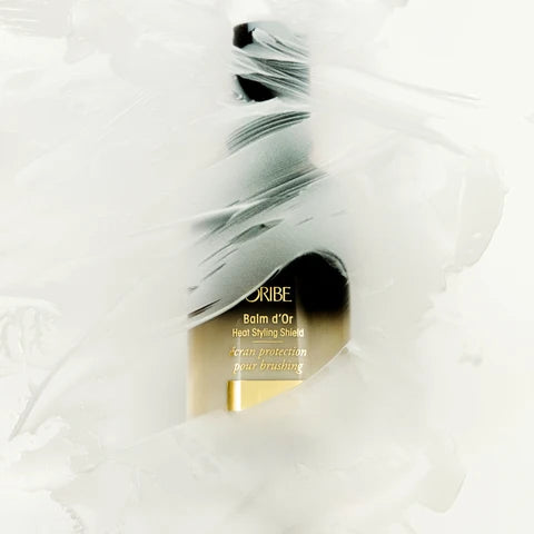 Oribe Balm d'Or Heat Styling Shield:  All hair types, especially colour-treated, fragile, or heat-styled hair that needs protection and restoration in one step.