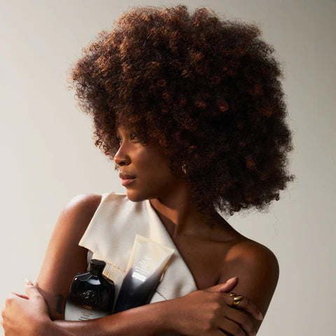 Oribe Gold Lust Shampoo Deeply cleanses while restoring strength and shine