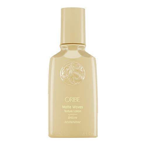 Oribe Matte Waves Texture Lotion: Effortless beachy waves without the crunch. 