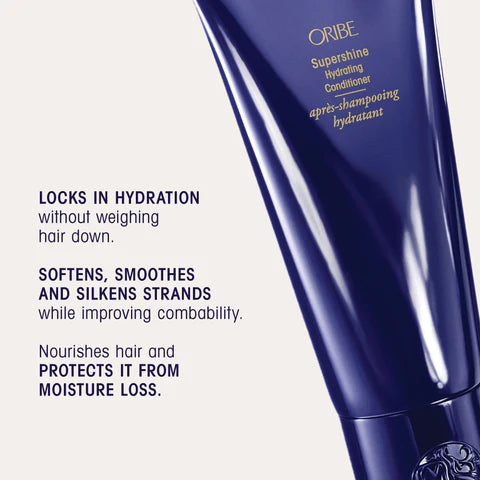 A close-up of an Oribe haircare tube labeled 'Supershine Hydrating Conditioner' on a light beige background with product benefits text.