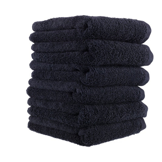 Stack of ten folded deluxe black salon towels made from 100% cotton, 40x70cm