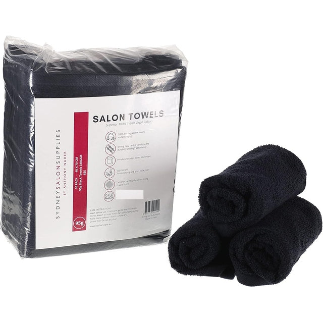Packaged set of black 95g cotton salon towels with three towels rolled beside the pack