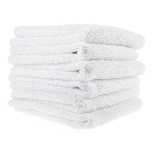 Stack of 10 white 33x33cm cotton washcloths folded neatly in a pile