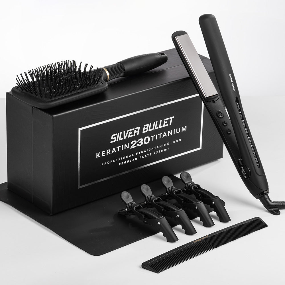 Hair straightening iron set with attachments and 'Silver Bullet' branding on a white background