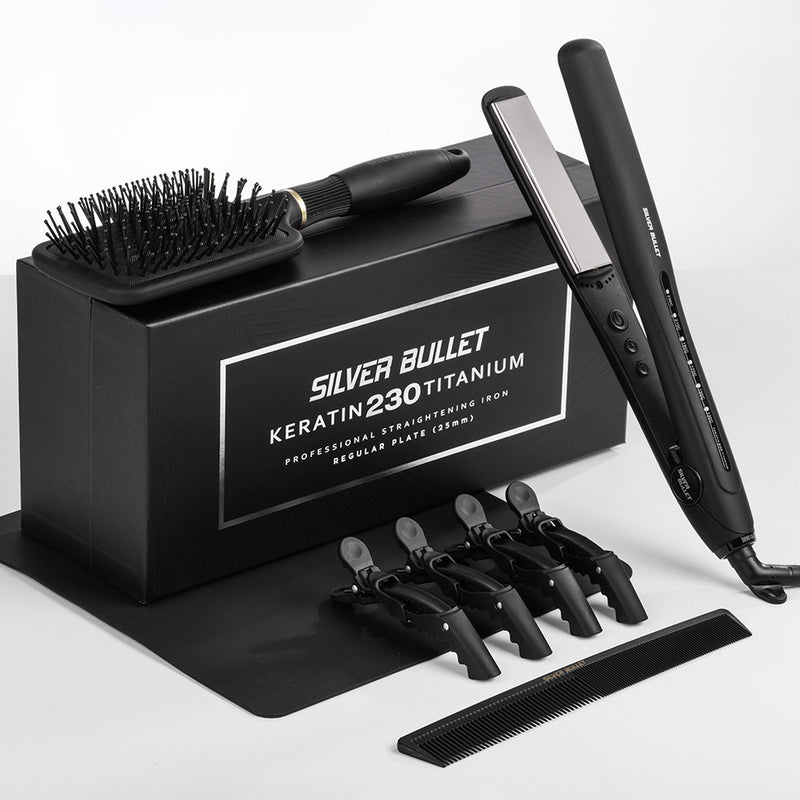 Hair straightening iron set with attachments and 'Silver Bullet' branding on a white background