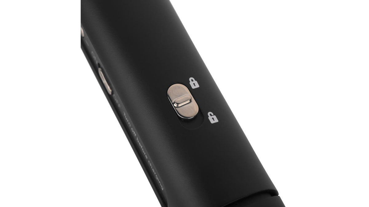 Detail of Silver Bullet cordless straightener handle with travel lock switch icons