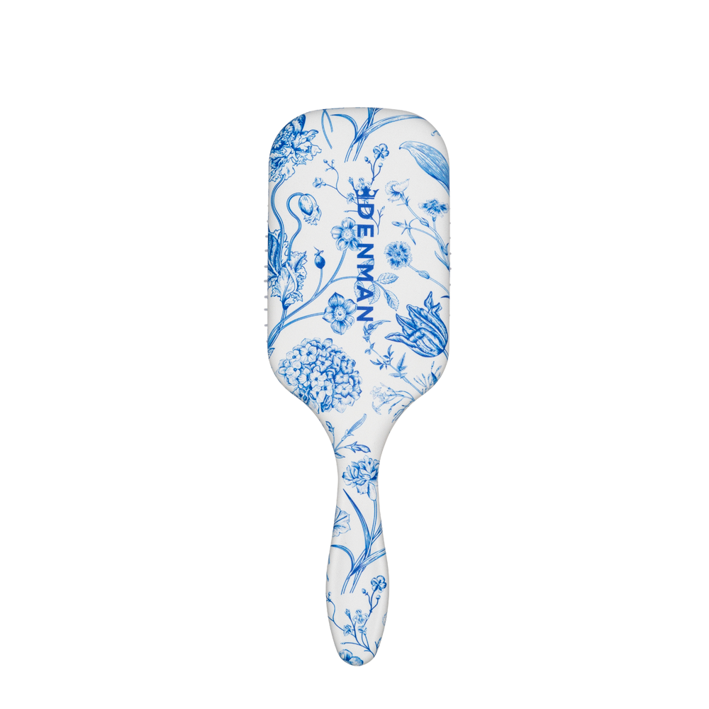 The Denman D38 Power Paddle Brush  delivers controlled tension for smooth, polished results while the Blue Belle print adds a bright finish to your styling kit