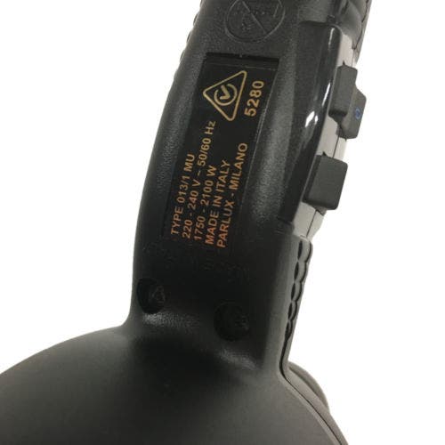 Close-up of TwinTurbo 3900 hair dryer handle showing Made in Italy label and specs
