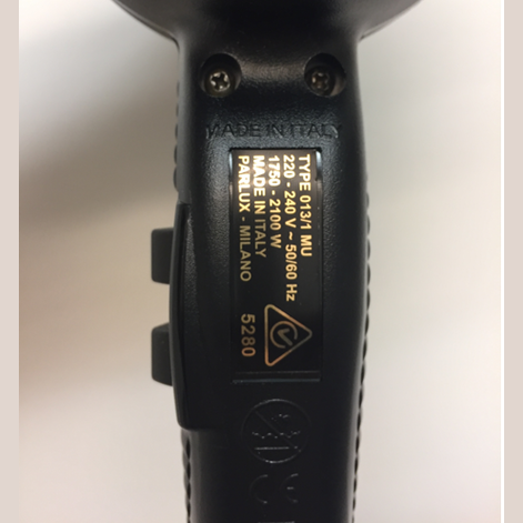 Close-up of TwinTurbo 3800 black hair dryer handle showing made in Italy 2100W label