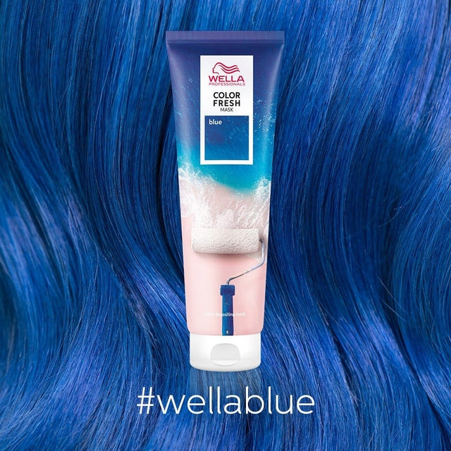 Wella Color Fresh Mask Blue tube placed on flowing bright blue hair with hashtag wellablue.