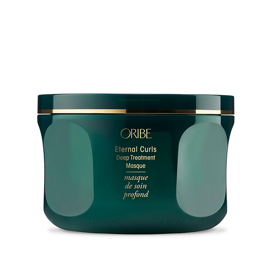 A dark teal-green jar of Oribe Eternal Curls Deep Treatment with gold lettering and a gold band on the lid, set against a plain white background.